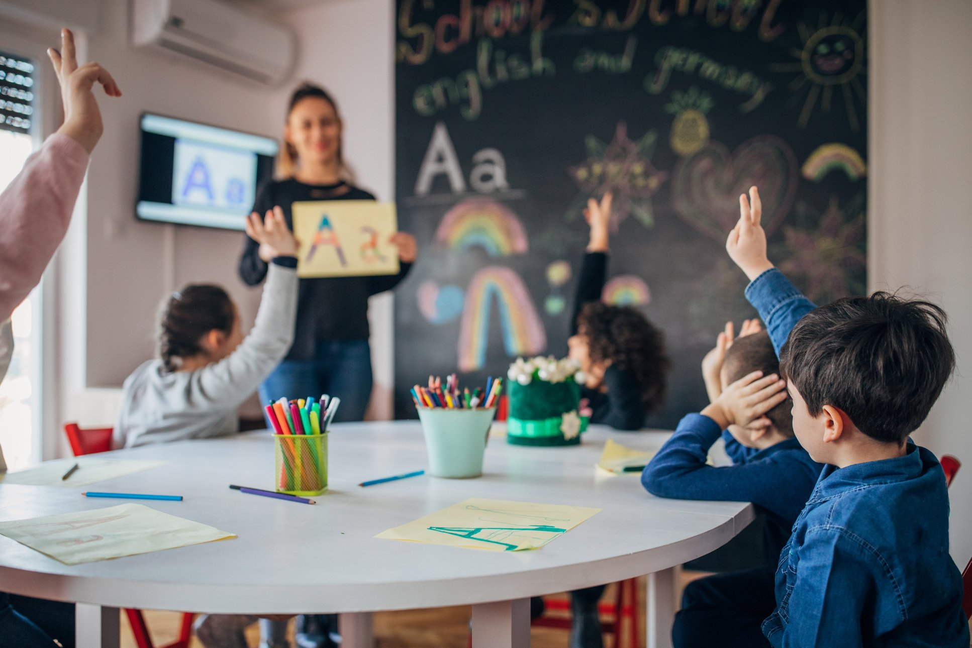 Preschool kids learning letters